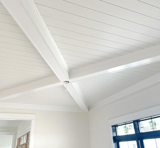 Tray ceiling painted bright white.